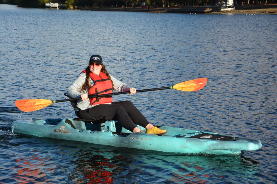 one person paddling in a kayak on Lake Natoma